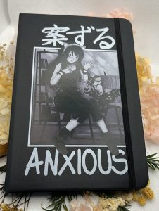 “Tokyo Spirit Anxious manga girl A5 notebook with elastic strap”