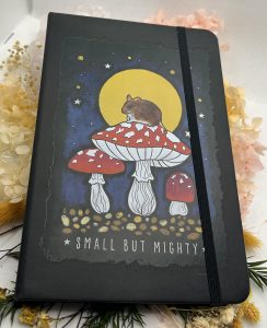 “‘Small But Mighty’ A5 hardback notebook with mouse on toadstools under moonlight”